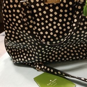 Kate Spade purse several sections and pockets with booklet very little use